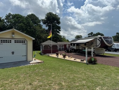 High end camping at its best is here.  Beautiful one bedroom on Captains Cove Golf and Yacht Club in Virginia - for sale on GolfHomes.com, golf home, golf lot