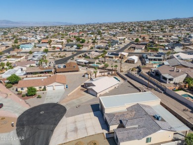 Welcome to this Cul-de-Sac Gem with Pool, RV Parking  30' Deep on London Bridge Golf Course in Arizona - for sale on GolfHomes.com, golf home, golf lot