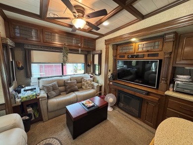 High end camping at its best is here.  Beautiful one bedroom on Captains Cove Golf and Yacht Club in Virginia - for sale on GolfHomes.com, golf home, golf lot