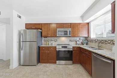 Nestled in the heart of Sun City, this home benefits from the on Sun City Country Club in Arizona - for sale on GolfHomes.com, golf home, golf lot