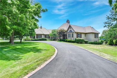 Experience refined living and ultimate privacy in this fully on Loch Lloyd Country Club in Missouri - for sale on GolfHomes.com, golf home, golf lot