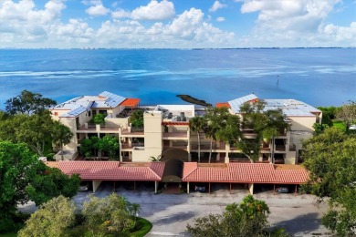 Waterfront End Unit with Breathtaking Sunsets & Natural Charm! on IMG Academies Golf and Country Club in Florida - for sale on GolfHomes.com, golf home, golf lot