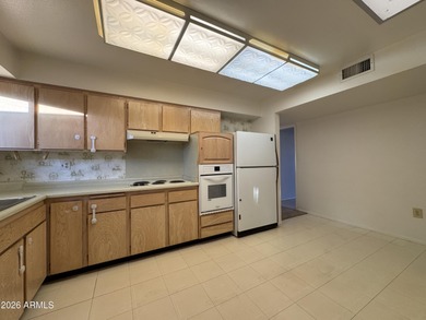 Location, location, location! This Sun City Shasta Model is on Sun City Lakes West and East in Arizona - for sale on GolfHomes.com, golf home, golf lot