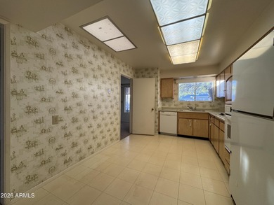 Location, location, location! This Sun City Shasta Model is on Sun City Lakes West and East in Arizona - for sale on GolfHomes.com, golf home, golf lot