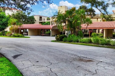 Waterfront End Unit with Breathtaking Sunsets & Natural Charm! on IMG Academies Golf and Country Club in Florida - for sale on GolfHomes.com, golf home, golf lot
