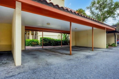 Waterfront End Unit with Breathtaking Sunsets & Natural Charm! on IMG Academies Golf and Country Club in Florida - for sale on GolfHomes.com, golf home, golf lot