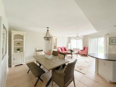 Discover this 2-bedroom, 2-bath first-floor condo in Quail on Quail Run Golf Club In Naples in Florida - for sale on GolfHomes.com, golf home, golf lot