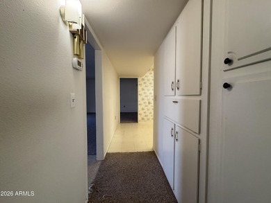 Location, location, location! This Sun City Shasta Model is on Sun City Lakes West and East in Arizona - for sale on GolfHomes.com, golf home, golf lot