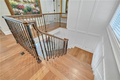 Experience refined living and ultimate privacy in this fully on Loch Lloyd Country Club in Missouri - for sale on GolfHomes.com, golf home, golf lot