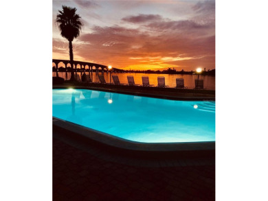 What can be better than walking out your back door, from your on Isla Del Sol Yacht and Country Club in Florida - for sale on GolfHomes.com, golf home, golf lot