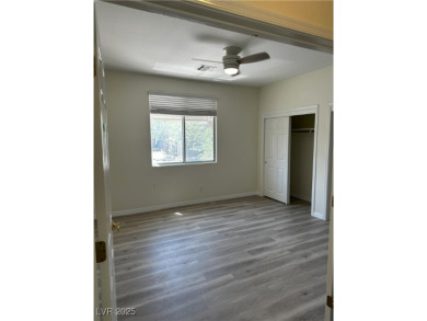 Discover luxury living in this beautifully updated two-story on TPC at Summerlin in Nevada - for sale on GolfHomes.com, golf home, golf lot