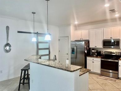 Stunning 4-bed, 2-bath home in renowned River Strand Golf and on River Strand Golf and Country Club At Heritage Harbour  in Florida - for sale on GolfHomes.com, golf home, golf lot