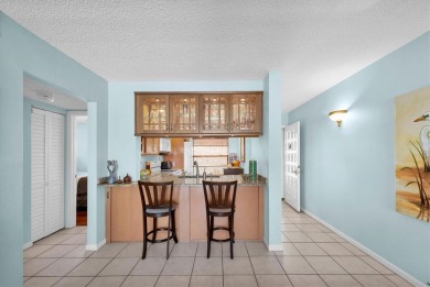 What can be better than walking out your back door, from your on Isla Del Sol Yacht and Country Club in Florida - for sale on GolfHomes.com, golf home, golf lot