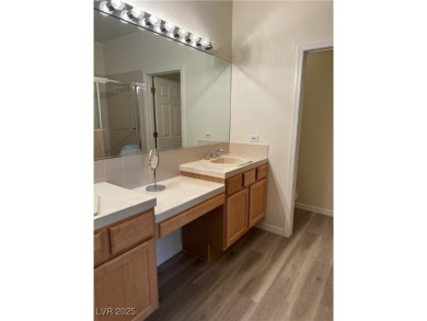Discover luxury living in this beautifully updated two-story on TPC at Summerlin in Nevada - for sale on GolfHomes.com, golf home, golf lot