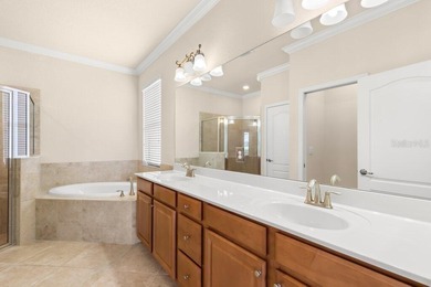 Stunning 4-bed, 2-bath home in renowned River Strand Golf and on River Strand Golf and Country Club At Heritage Harbour  in Florida - for sale on GolfHomes.com, golf home, golf lot