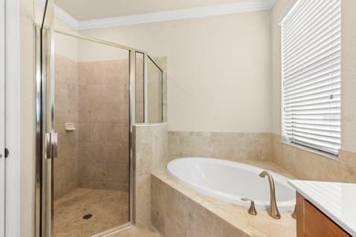 Stunning 4-bed, 2-bath home in renowned River Strand Golf and on River Strand Golf and Country Club At Heritage Harbour  in Florida - for sale on GolfHomes.com, golf home, golf lot