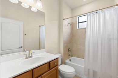 Stunning 4-bed, 2-bath home in renowned River Strand Golf and on River Strand Golf and Country Club At Heritage Harbour  in Florida - for sale on GolfHomes.com, golf home, golf lot