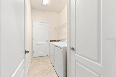 Stunning 4-bed, 2-bath home in renowned River Strand Golf and on River Strand Golf and Country Club At Heritage Harbour  in Florida - for sale on GolfHomes.com, golf home, golf lot