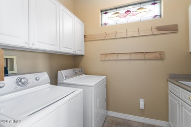 Check this out!!! This beautiful Cambridge situated on hole #1 on Cimarron Golf Club in Arizona - for sale on GolfHomes.com, golf home, golf lot