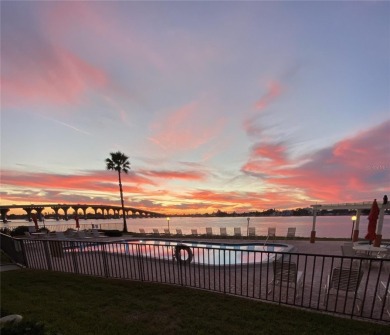 What can be better than walking out your back door, from your on Isla Del Sol Yacht and Country Club in Florida - for sale on GolfHomes.com, golf home, golf lot