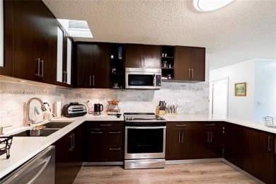 Beautiful 3-bedroom, 2-bathroom townhome with a spacious outdoor on The Club at Emerald Hills in Florida - for sale on GolfHomes.com, golf home, golf lot