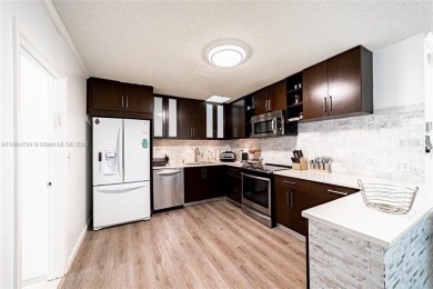 Beautiful 3-bedroom, 2-bathroom townhome with a spacious outdoor on The Club at Emerald Hills in Florida - for sale on GolfHomes.com, golf home, golf lot