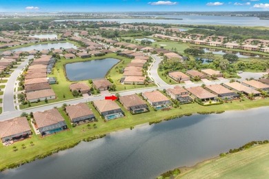 Stunning 4-bed, 2-bath home in renowned River Strand Golf and on River Strand Golf and Country Club At Heritage Harbour  in Florida - for sale on GolfHomes.com, golf home, golf lot