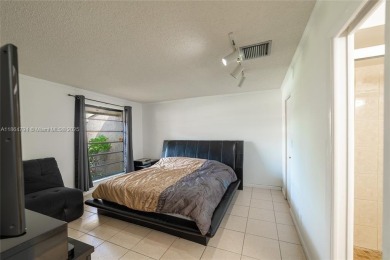 Beautiful 3-bedroom, 2-bathroom townhome with a spacious outdoor on The Club at Emerald Hills in Florida - for sale on GolfHomes.com, golf home, golf lot