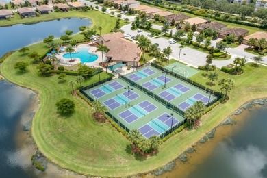 Stunning 4-bed, 2-bath home in renowned River Strand Golf and on River Strand Golf and Country Club At Heritage Harbour  in Florida - for sale on GolfHomes.com, golf home, golf lot