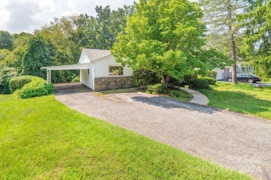 This stylish ranch home with mid century modern touches is a on Asheville Municipal Golf Course in North Carolina - for sale on GolfHomes.com, golf home, golf lot