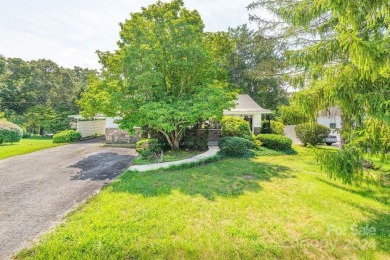 This stylish ranch home with mid century modern touches is a on Asheville Municipal Golf Course in North Carolina - for sale on GolfHomes.com, golf home, golf lot