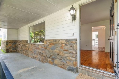 This stylish ranch home with mid century modern touches is a on Asheville Municipal Golf Course in North Carolina - for sale on GolfHomes.com, golf home, golf lot