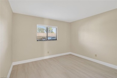 This beautifully renovated first-floor residence offers 2 on Royal Palm Golf Club in Florida - for sale on GolfHomes.com, golf home, golf lot