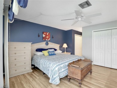 Discover this charming 2-bedroom, 2-bath waterfront home on The Glades Golf and Country Club in Florida - for sale on GolfHomes.com, golf home, golf lot