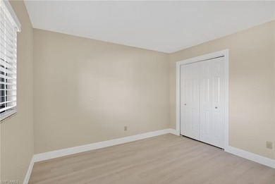 This beautifully renovated first-floor residence offers 2 on Royal Palm Golf Club in Florida - for sale on GolfHomes.com, golf home, golf lot