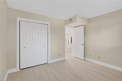 This beautifully renovated first-floor residence offers 2 on Royal Palm Golf Club in Florida - for sale on GolfHomes.com, golf home, golf lot