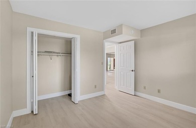 This beautifully renovated first-floor residence offers 2 on Royal Palm Golf Club in Florida - for sale on GolfHomes.com, golf home, golf lot