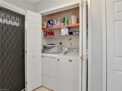 Discover this charming 2-bedroom, 2-bath waterfront home on The Glades Golf and Country Club in Florida - for sale on GolfHomes.com, golf home, golf lot