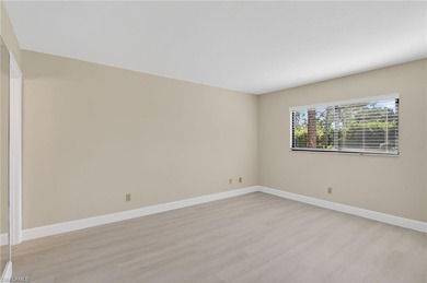 This beautifully renovated first-floor residence offers 2 on Royal Palm Golf Club in Florida - for sale on GolfHomes.com, golf home, golf lot