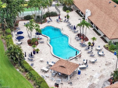 Discover this charming 2-bedroom, 2-bath waterfront home on The Glades Golf and Country Club in Florida - for sale on GolfHomes.com, golf home, golf lot