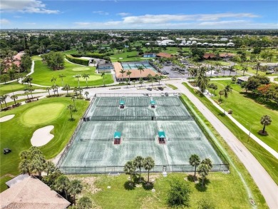 Discover this charming 2-bedroom, 2-bath waterfront home on The Glades Golf and Country Club in Florida - for sale on GolfHomes.com, golf home, golf lot