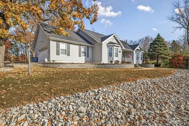 Water view sprawling ranch  home in beautiful Raintreee on Raintree Country Club in Missouri - for sale on GolfHomes.com, golf home, golf lot