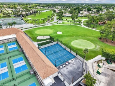 Discover this charming 2-bedroom, 2-bath waterfront home on The Glades Golf and Country Club in Florida - for sale on GolfHomes.com, golf home, golf lot