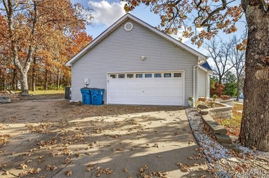 Water view sprawling ranch  home in beautiful Raintreee on Raintree Country Club in Missouri - for sale on GolfHomes.com, golf home, golf lot
