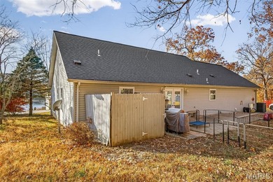 Water view sprawling ranch  home in beautiful Raintreee on Raintree Country Club in Missouri - for sale on GolfHomes.com, golf home, golf lot