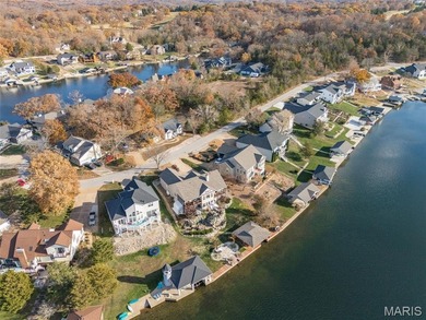 Water view sprawling ranch  home in beautiful Raintreee on Raintree Country Club in Missouri - for sale on GolfHomes.com, golf home, golf lot