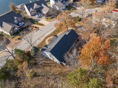 Water view sprawling ranch  home in beautiful Raintreee on Raintree Country Club in Missouri - for sale on GolfHomes.com, golf home, golf lot