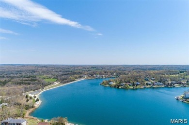 Water view sprawling ranch  home in beautiful Raintreee on Raintree Country Club in Missouri - for sale on GolfHomes.com, golf home, golf lot