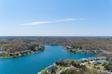 Water view sprawling ranch  home in beautiful Raintreee on Raintree Country Club in Missouri - for sale on GolfHomes.com, golf home, golf lot