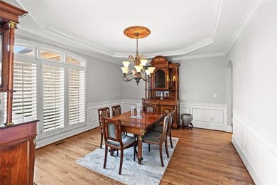 Wake up every day to sweeping golf course views overlooking the on Woodmont Golf and Country Club in Georgia - for sale on GolfHomes.com, golf home, golf lot